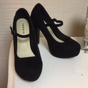 Black suede pumps